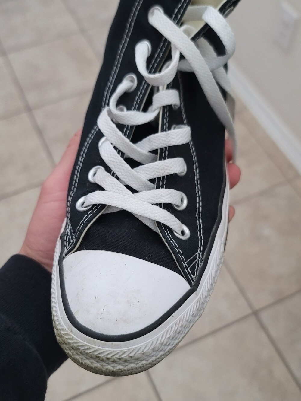 Classic Black Canvas High-Top Sneaker with White Toe